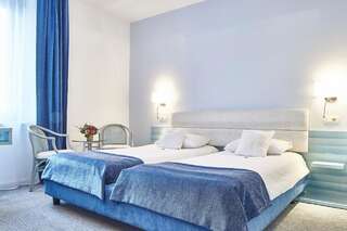 Отель Continental Forum Sibiu Сибиу Улучшенный двухместный номер с 2 отдельными кроватями-2